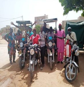 Photo 2: Reception of motorcycles and moto tricycles for cashew nut collection by cooperatives thanks to the support of USDA. Photo credit Brigitte Sagna of Shelter For Life